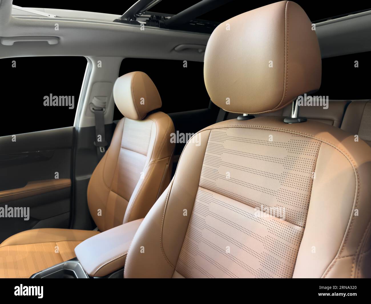 Modern luxury car brown leather interior. Part of orange leather car