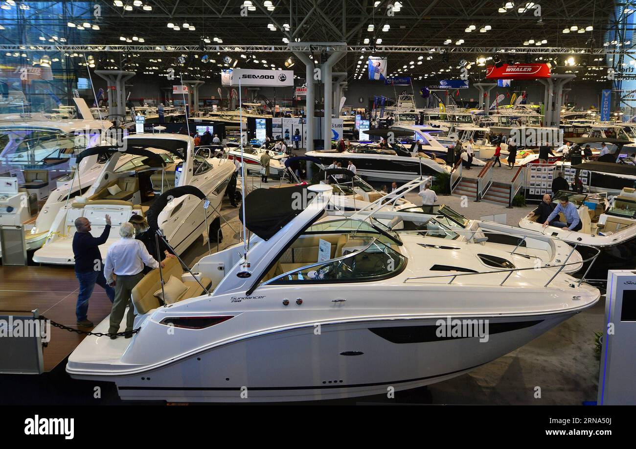 (160106) -- NEW YORK, Jan. 6, 2016 -- People visit New York Boat Show in New York, the United States, on Jan. 6, 2016. The five-day New York Boat Show which features the latest and greatest in boating, including kayaks, yachts and water sport boats with high technology kicked off at the Javits Center in New York on Wednesday. ) U.S.-NEW YORK-BOAT SHOW WangxLei PUBLICATIONxNOTxINxCHN   160106 New York Jan 6 2016 Celebrities Visit New York Boat Show in New York The United States ON Jan 6 2016 The Five Day New York Boat Show Which Features The Latest and Greatest in Boating including Kayaks Yacht Stock Photo