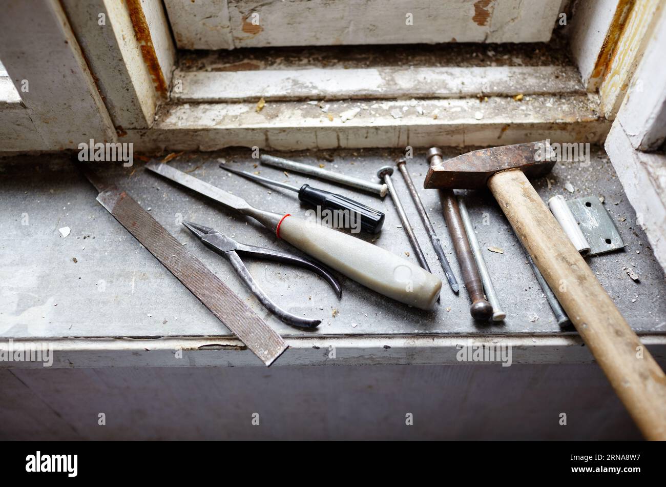 Repairing old damaged window or dismantling before installing new, closeup. Repairing a window