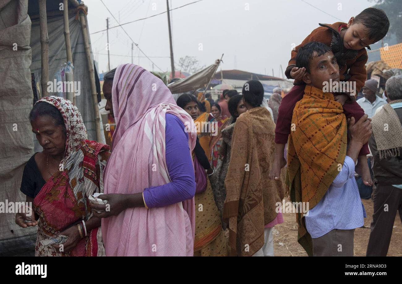 BOLPUR,  -- Indian Hindu devotees visit the Joydev Fair beside the Ajay river, some 200 kilometers away from Kolkata, capital of eastern Indian state West Bengal, Jan. 14, 2016. A large number of Hindu pilgrims converging for the Joydev Fair which is culminating on the occasion of Makar Sankranti, a holy day of the Hindu calendar, during which taking a dip is considered to be of great religious significance. ) INDIA-WEST BENGAL-JOYDEV FAIR TumpaxMondal PUBLICATIONxNOTxINxCHN   Bolpur Indian Hindu devotees Visit The Joydev Fair Beside The Ajay River Some 200 Kilometers Away from Kolkata Capital Stock Photo