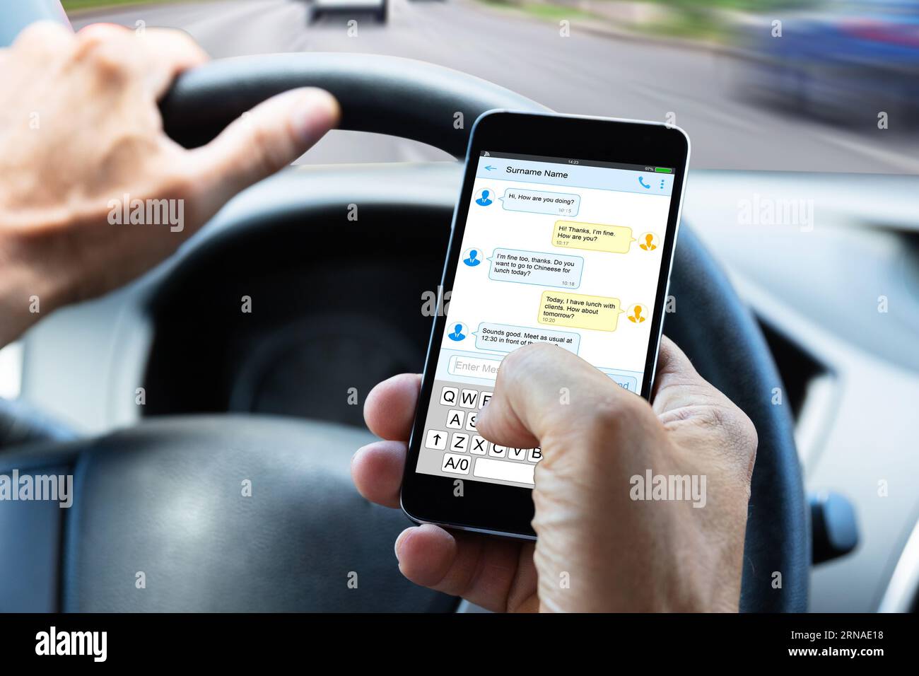 Close-up Of A Man's Hand Typing Text Message On Mobile Phone While ...
