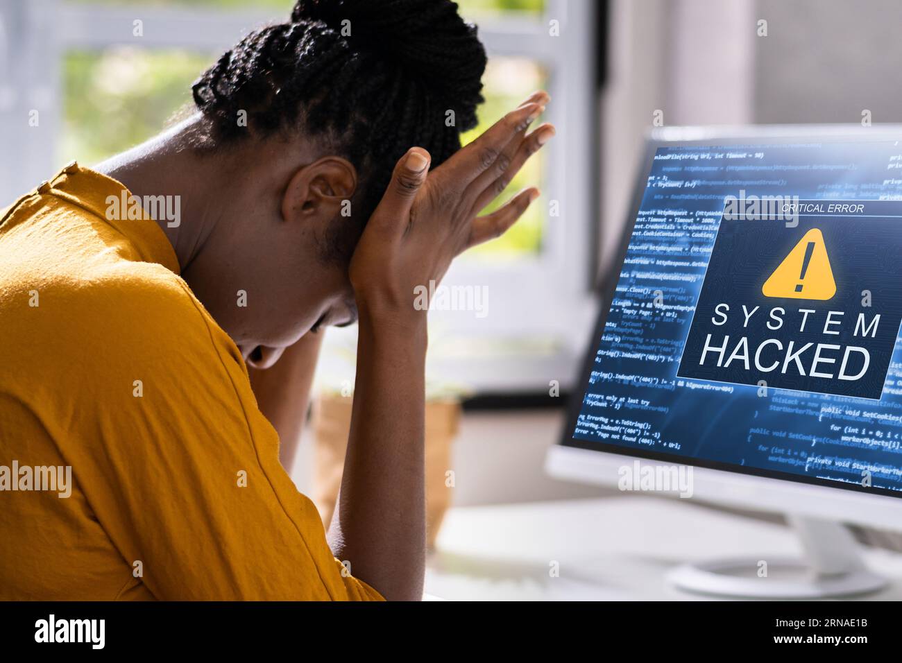 Computer System Hacked. Virus Software Screen On Monitor Stock Photo