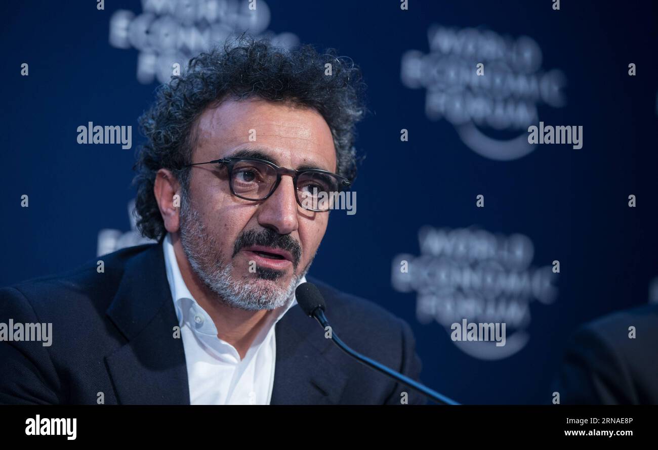 (160122) -- DAVOS, Jan. 22, 2016 -- Hamdi Ulukaya, founder of American yogurt producer Chobani, addresses a joint press conference in Davos, Switzerland, Jan. 22, 2016. Yoghurt empire founder Hamdi Ulukaya announced in Davos that his Tent Foundation will partner with Airbnb, LinkedIn, MasterCard, UPS and IKEA Foundation to address the global refugee crisis. ) SWITZERLAND-DAVOS-REFUGEE CRISIS XuxJinquan PUBLICATIONxNOTxINxCHN   160122 Davos Jan 22 2016 Hamdi  Founder of American Yogurt Producer Chobani addresses a Joint Press Conference in Davos Switzerland Jan 22 2016 Yoghurt Empire Founder Ha Stock Photo