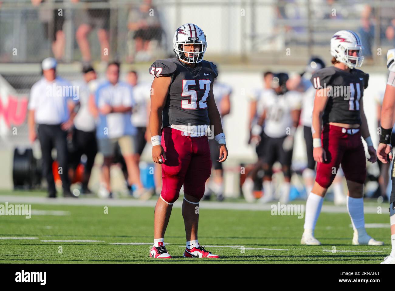 August 31, 2023:.Southern Nazarine University Crimson Storm Defensive End Julian Campos (52) looks for the play during the NCAA Football game between the Harding University Bison and the Southern Nazarene University Crimson Storm at SNU Stadium in Bethany, OK. Ron Lane/CSM Stock Photo