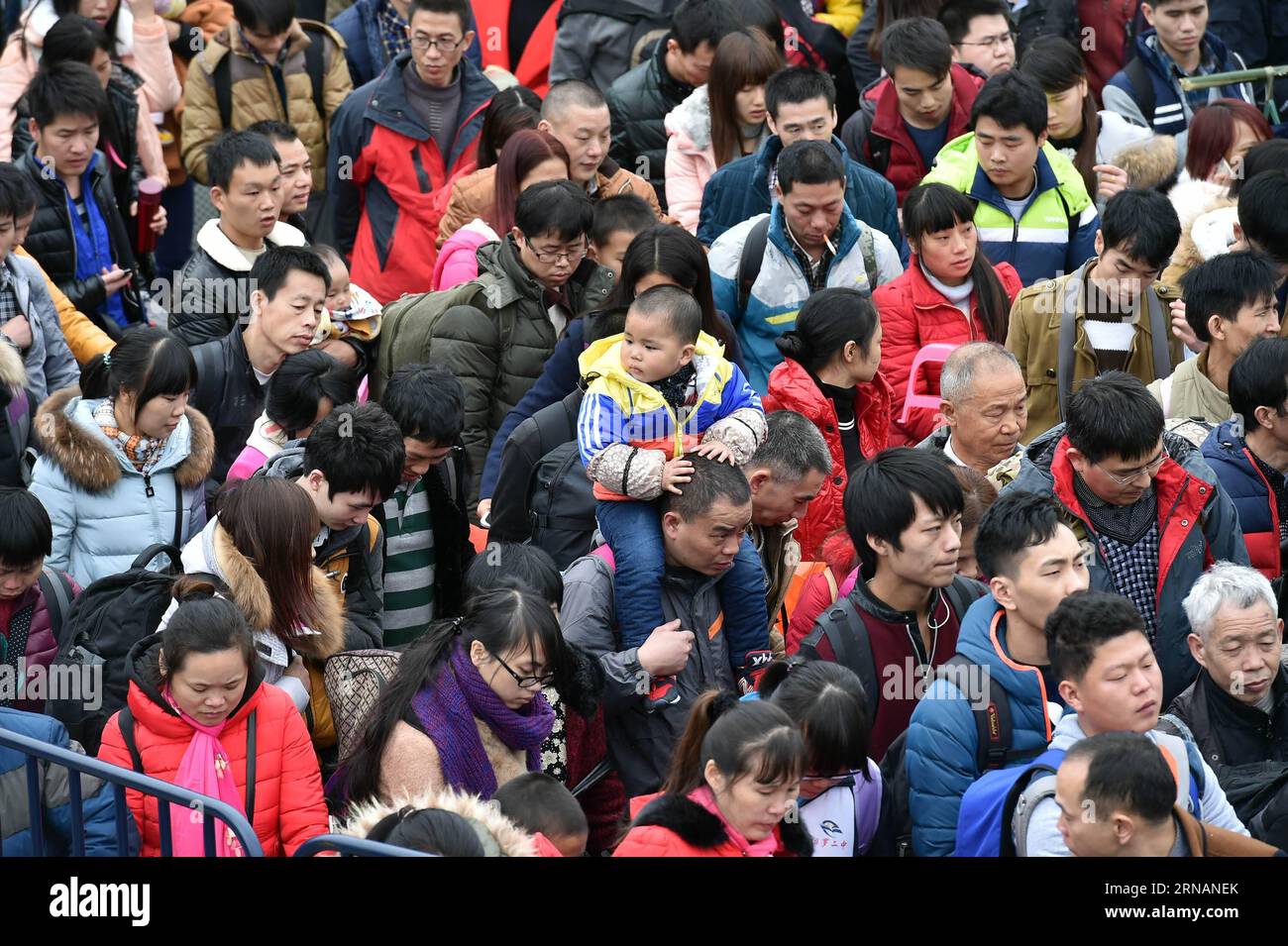 (160202) -- GUANGZHOU, Feb. 2, 2016 -- Passengers rushing home for the coming Spring Festival, or the Chinese Lunar New Year, are seen stranded out of Guangzhou railway station in Guangzhou,south China s Guangdong Province, Feb. 2, 2016. Some 50,000 passengers were detained in the railway station due to delays of trains caused by continous bad weather. ) (cxy) CHINA-GUANGZHOU-RAILWAY-PASSENGER-DELAY (CN) LiangxXu PUBLICATIONxNOTxINxCHN   Guangzhou Feb 2 2016 Passengers Rushing Home for The Coming Spring Festival or The Chinese Lunar New Year are Lakes stranded out of Guangzhou Railway Station Stock Photo