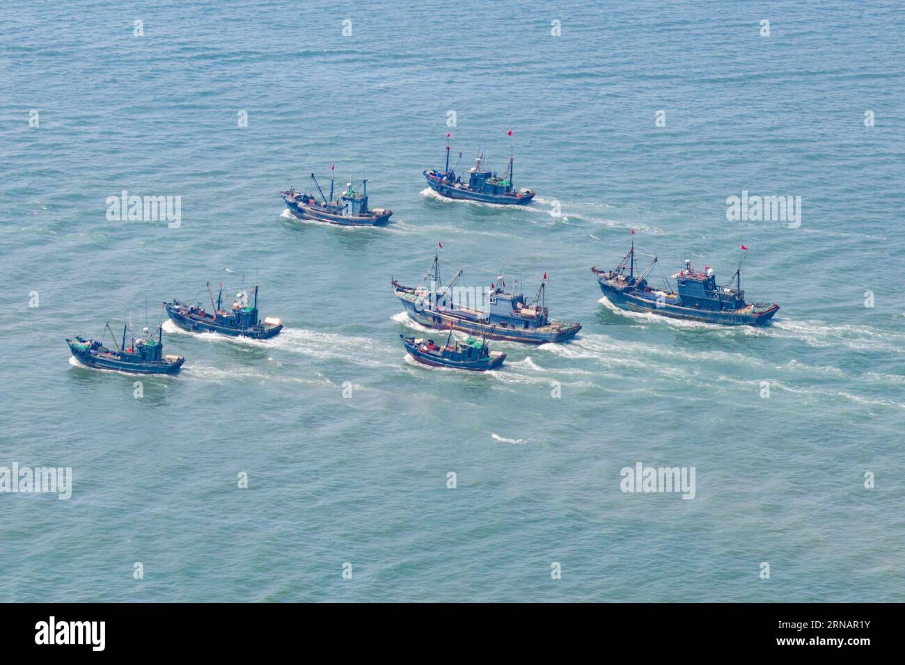 QINGDAO, CHINA - SEPTEMBER 1, 2023 - Fishing boats head to the Yellow Sea for the start of autumn fishing production in Qingdao, Shandong Province, Ch Stock Photo