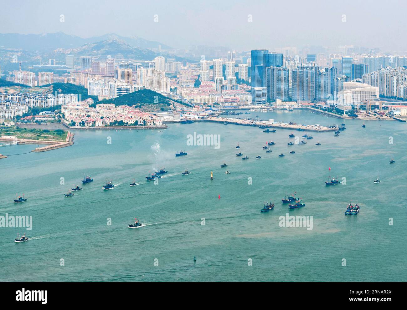QINGDAO, CHINA - SEPTEMBER 1, 2023 - Fishing boats head to the Yellow Sea for the start of autumn fishing production in Qingdao, Shandong Province, Ch Stock Photo
