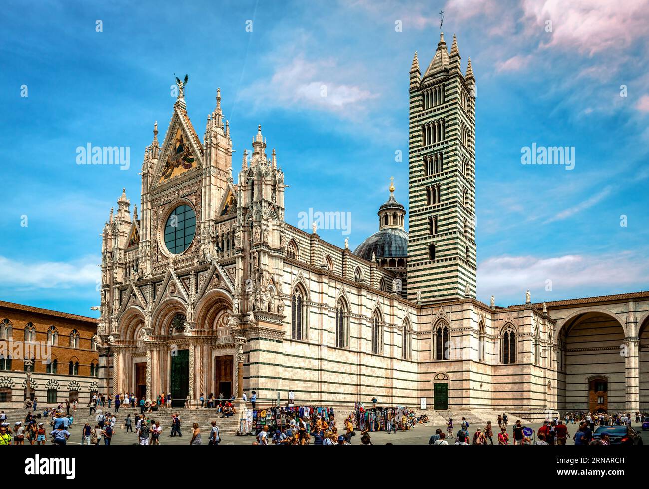 Siena, Italy - May 29 2018: The Cathedral. The church was designed and completed between 1215 and 1263 and its dedicated to the Assumption of Mary. Stock Photo