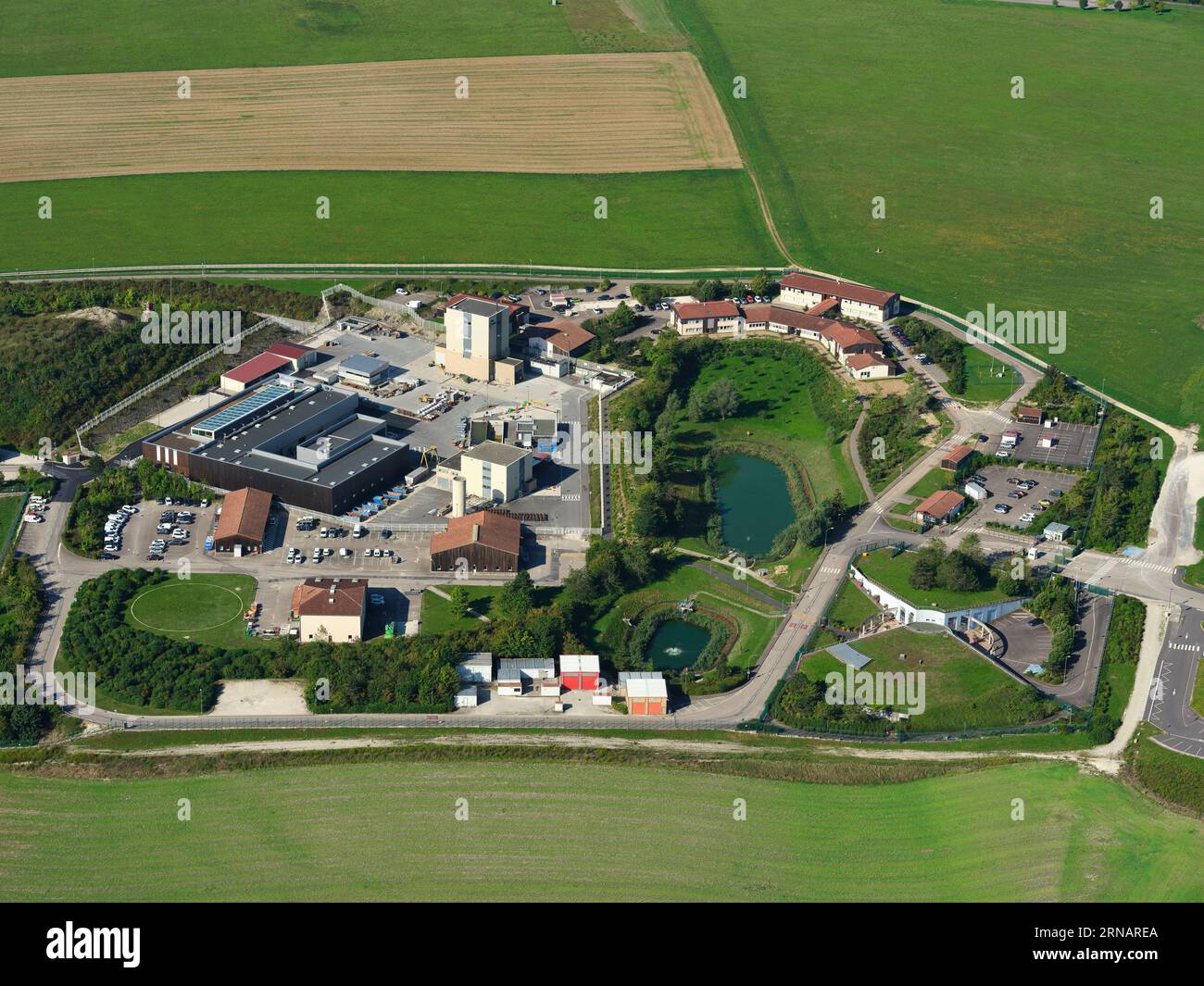 AERIAL VIEW. Ground level infrastructure of an underground research laboratory for the study of long-term storage of nuclear waste. Bure, France. Stock Photo