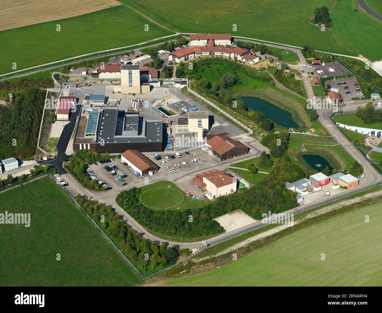 AERIAL VIEW. Ground level infrastructure of an underground research laboratory for the study of long-term storage of nuclear waste. Bure, France. Stock Photo