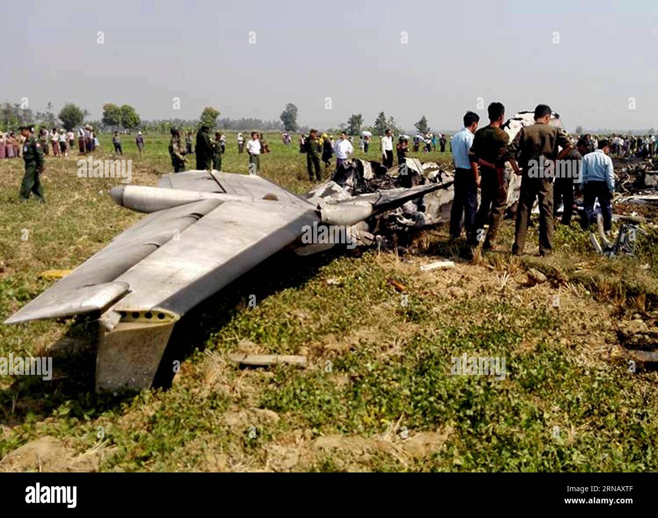 (160210) -- NAY PYI TAW, Feb. 10, 2016 -- Myanmar military personnel inspect the wreckage of a military aircraft which crashed near Shwepyitha village tract in Lewe township of Nay Pyi Taw, Myanmar, Feb. 10, 2016. Five military personnel were killed after a military-owned plane crashed in Myanmar s new capital of Nay Pyi Taw on Wednesday morning, Defence Services Commander-in-Chief office confirmed. The BEECH-1900D aircraft carrying five military officers who were flying during flight routine check crashed and burnt up near Shwepyitha village tract in Lewe township of Nay Pyi Taw shortly after Stock Photo