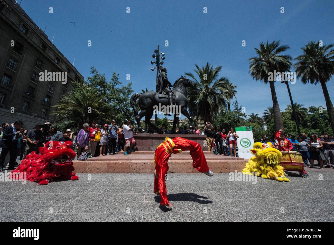 Dancers perform Lion Dance during the Chinese Lunar New Year and Feast of Santiago celebrations, at the Plaza de Armas in Santiago, capital of Chile, on Feb. 12, 2016. Feast of Santiago celebrates the 475th anniversary of the founding of the Chilean capital of Santiago by Pedro de Valdivia. Jorge Villegas) (jg) (fnc) CHILE-SANTIAGO-CHINA-LUNAR NEW YEAR e JORGExVILLEGAS PUBLICATIONxNOTxINxCHN   Dancers perform Lion Dance during The Chinese Lunar New Year and Feast of Santiago celebrations AT The Plaza de Armas in Santiago Capital of Chile ON Feb 12 2016 Feast of Santiago celebrates The 475th An Stock Photo