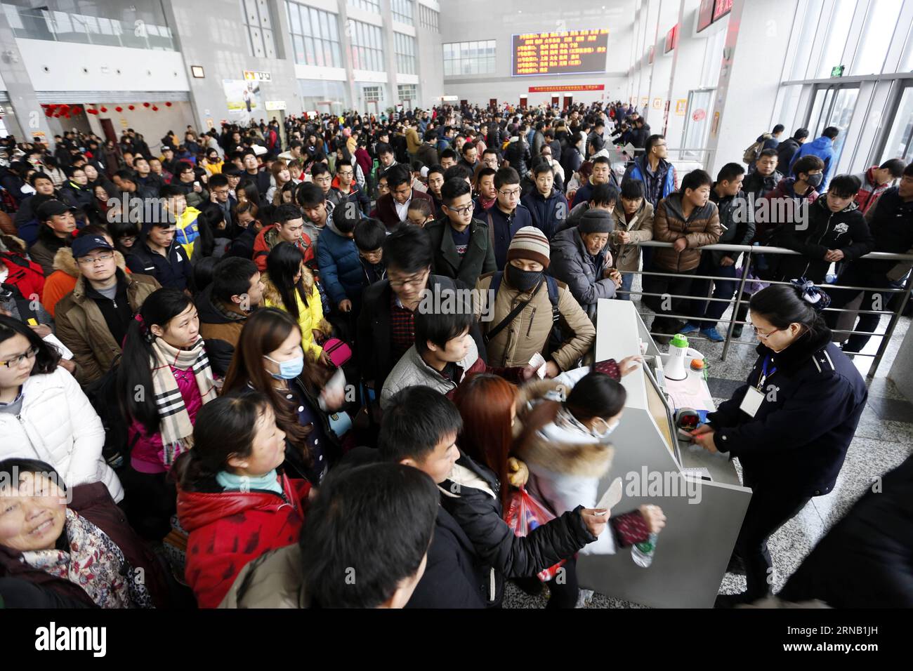 LIANYUNGANG  Passengers prepare to have tickets checked at a passenger station in Lianyungang, east China s Jiangsu Province, Feb. 13, 2016. Chinese passengers made a record number of trips during the Spring Festival holiday, according to the Ministry of Transport (MOT) on Sunday. Passenger trips reached 400 million from Feb. 7 to 13, up 6.7 percent from last year, MOT data showed. Over 47 million trips were made by rail, more than 333 million on road and about 8.5 million by air. Road trips were up by 7 percent. ) (lfj) CHINA-SPRING FESTIVAL HOLIDAY-TRIPS (CN) SixWei PUBLICATIONxNOTxINxCHN Stock Photo