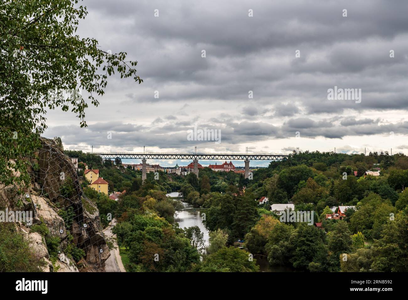 Railway bridge above Dyje river with Loucky klaster on the background in Znojmo city in Czech republic - view from Znojemsky hrad Stock Photo