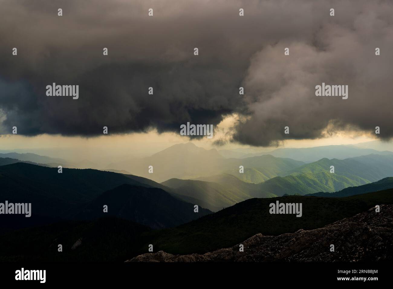 Mountain landscape strange clouds formation Stock Photo