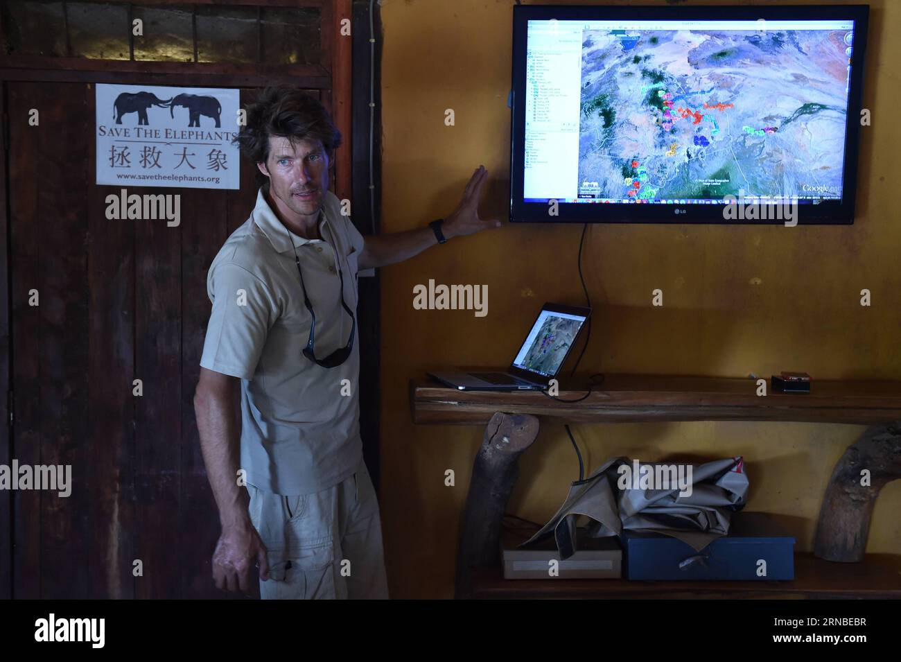 (160303) -- SAMBURU, March 3, 2016 -- Frank, Chief Operation Officer of Save the Elephants (STE), introduces the tracking and research of elephant positions and movements under the help of modern technology, at STE camp in Samburu National Reserve, Kenya, March 1, 2016. In northern Kenya s Samburu region, there lives the second largest group of elephant species in this country. Around them, a number of elephant defenders have watched them day and night for the past 18 years. Founded in 1993, the organization Save The Elephants (STE) has been devoting its attention to secure the future of eleph Stock Photo