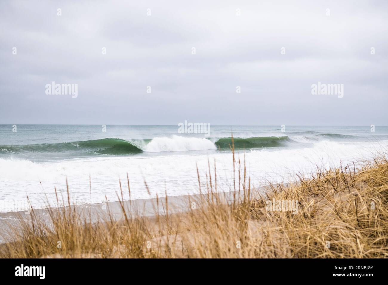 Ocean Waves on a Gray Winter Day at the Beach Stock Photo