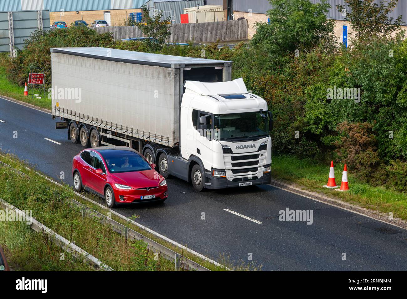 Scania lorry, A12 dual carriageway main road, Martlesham, Suffolk, England, UK Stock Photo