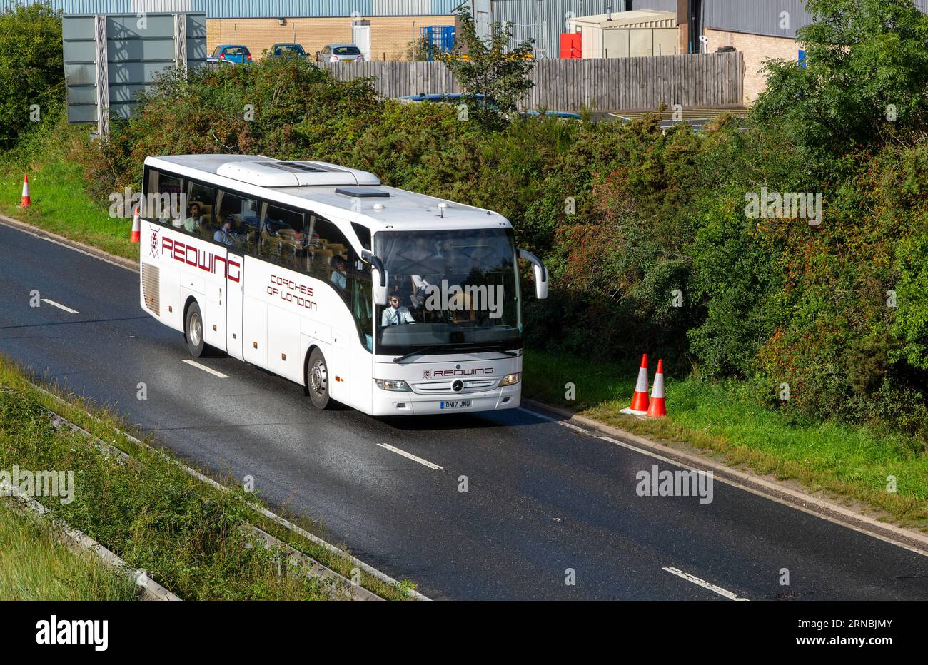 Redwing coaches of London coach bus, A12 dual carriageway main road, Martlesham, Suffolk