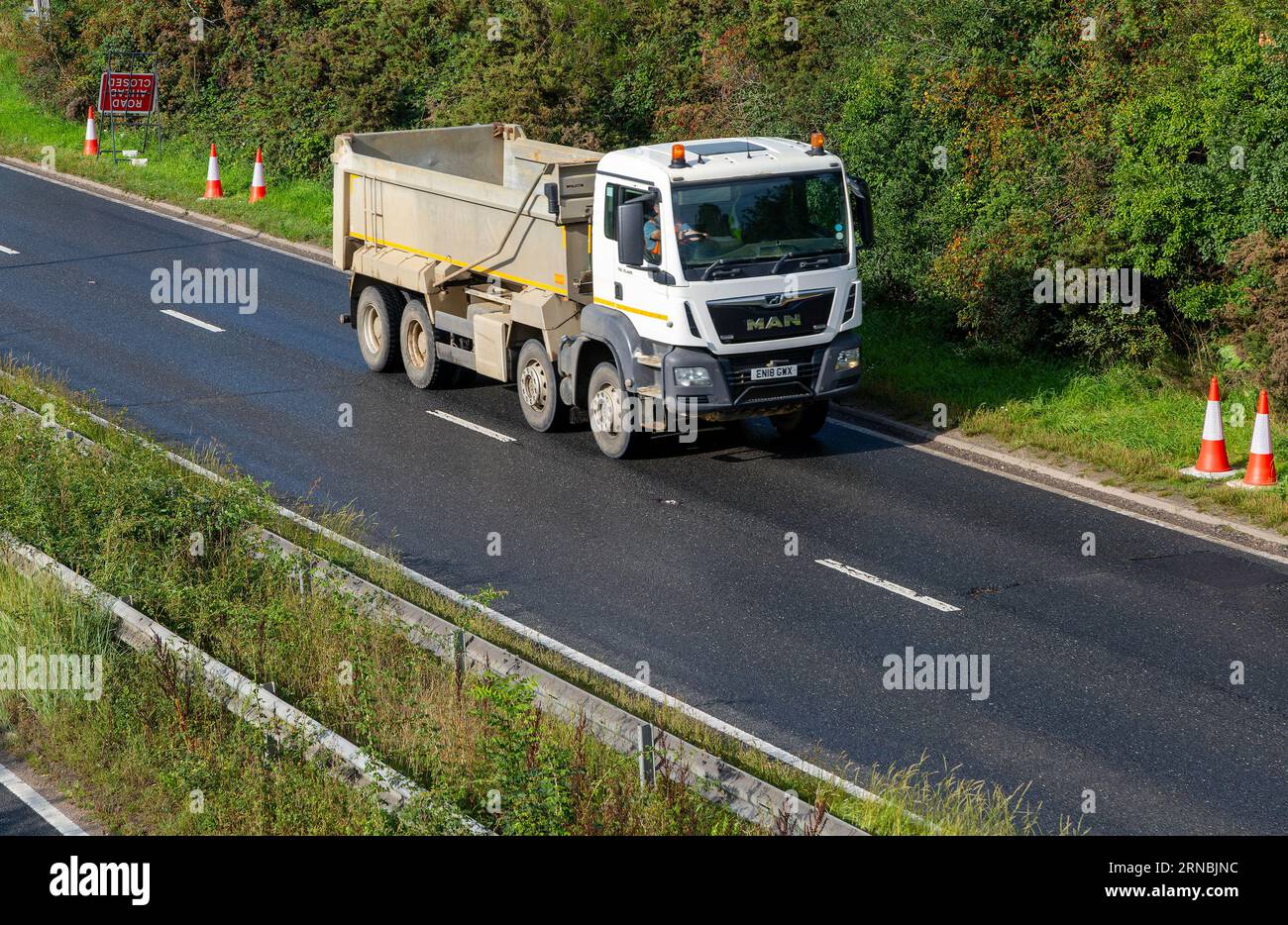 MAN tipper truck vehicle, A12 dual carriageway main road, Martlesham, Suffolk, England, UK Stock