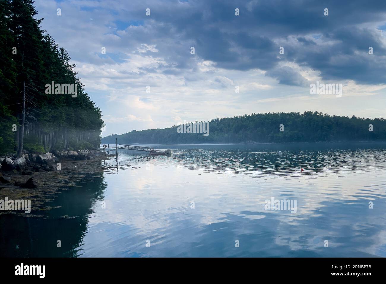 Boats and docks along the Sheepscot River near Maine Stock
