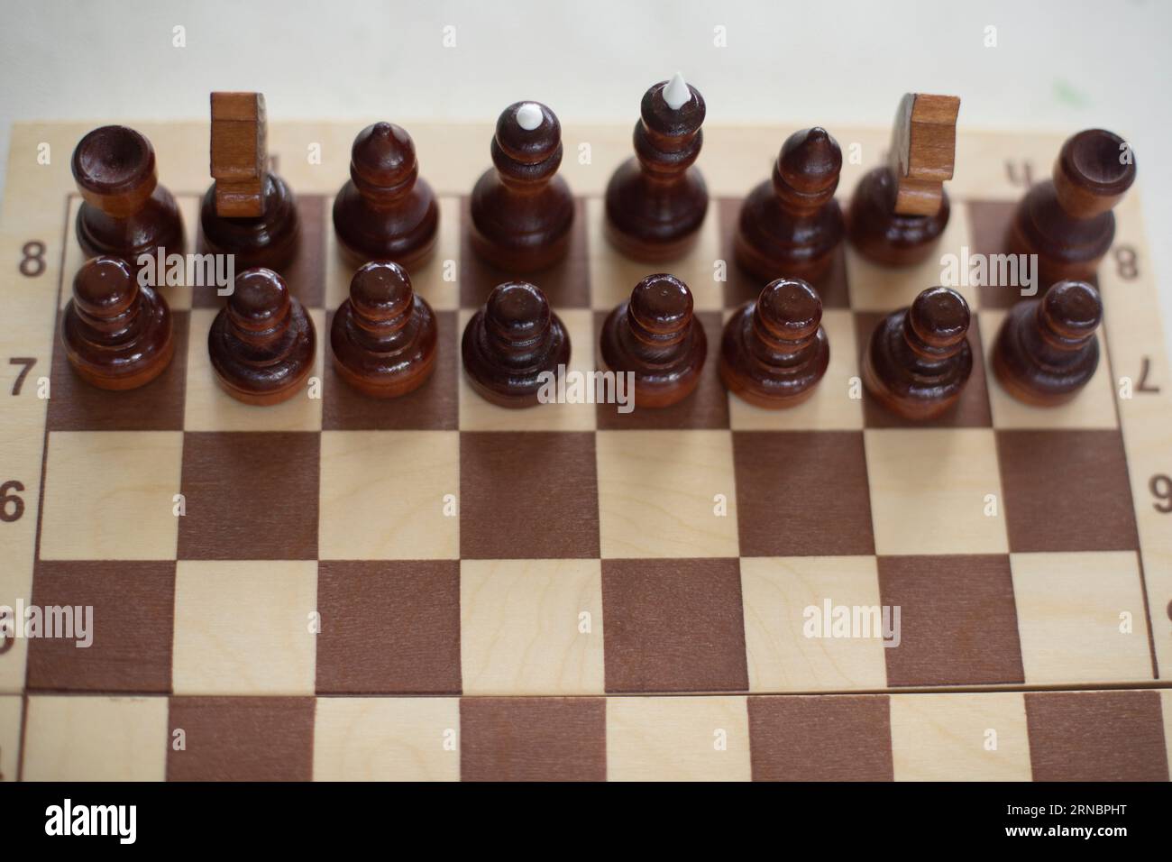 Playing chess in tournament. Chess pieces on board. Stock Photo