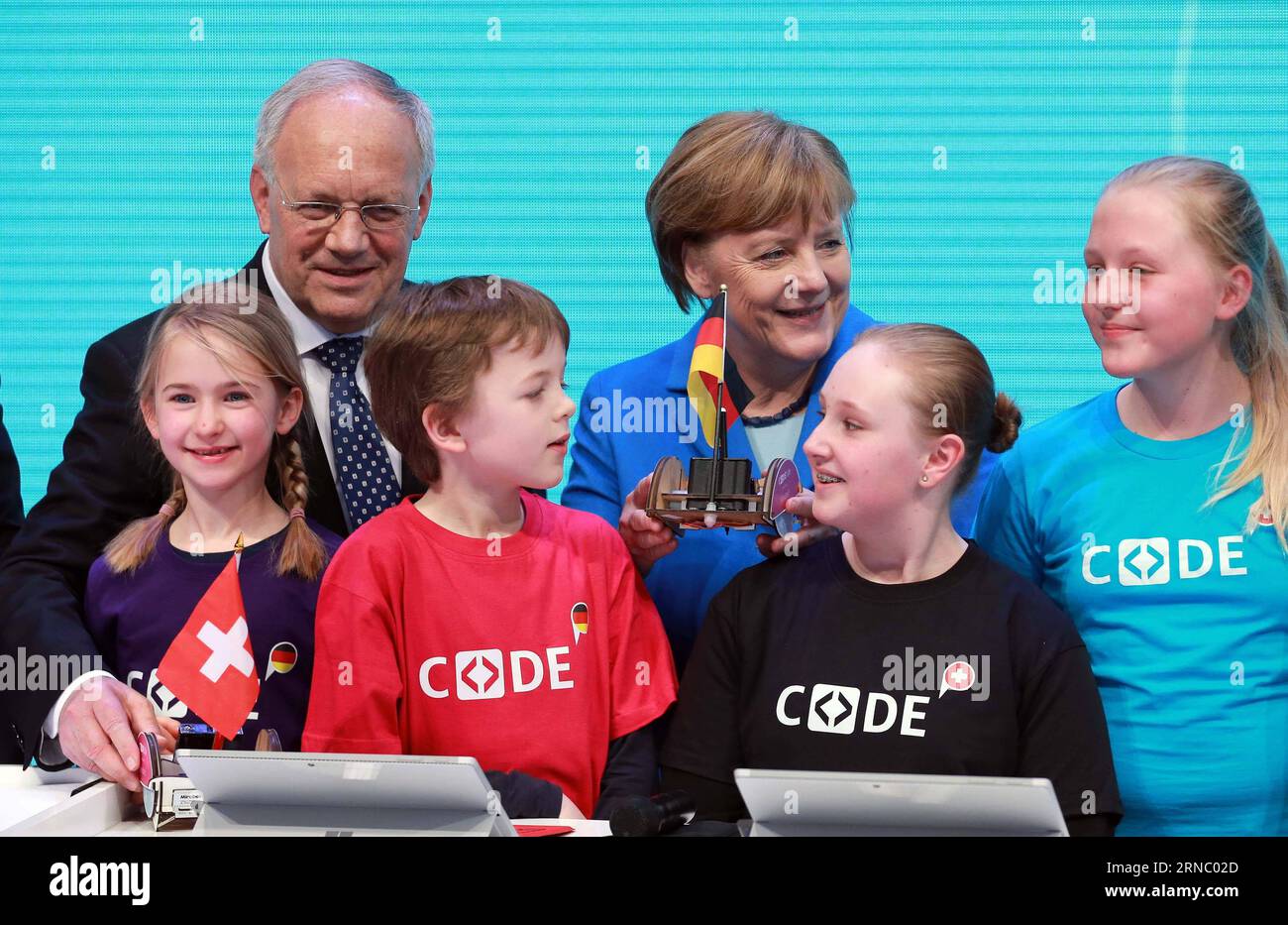 (160315) -- HANOVER, March 15, 2016 -- German chancellor Angela Merkel (C, rear) and Swiss President Johann Schneider-Ammann (L, rear) visit the Microsoft booth during their visit to the CeBIT 2016 in Hanover, central Germany, on March 15, 2016. Switzerland is the partner country of the CeBIT 2016. ) GERMANY-HANOVER-CEBIT-SWITZERLAND LuoxHuanhuan PUBLICATIONxNOTxINxCHN   Hanover March 15 2016 German Chancellor Angela Merkel C Rear and Swiss President Johann Schneider Ammann l Rear Visit The Microsoft Booth during their Visit to The CeBit 2016 in Hanover Central Germany ON March 15 2016 Switzer Stock Photo