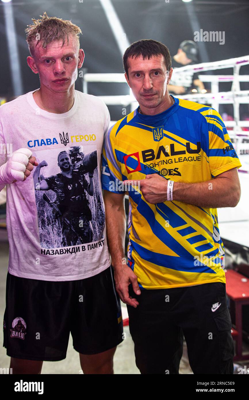 Legendary Ukrainian welter WBA world champ and coach Slava Senchenko (r) and Ukraine middleweight prospect Denis Korenev after fight,Brovary12.08.2023 Stock Photo