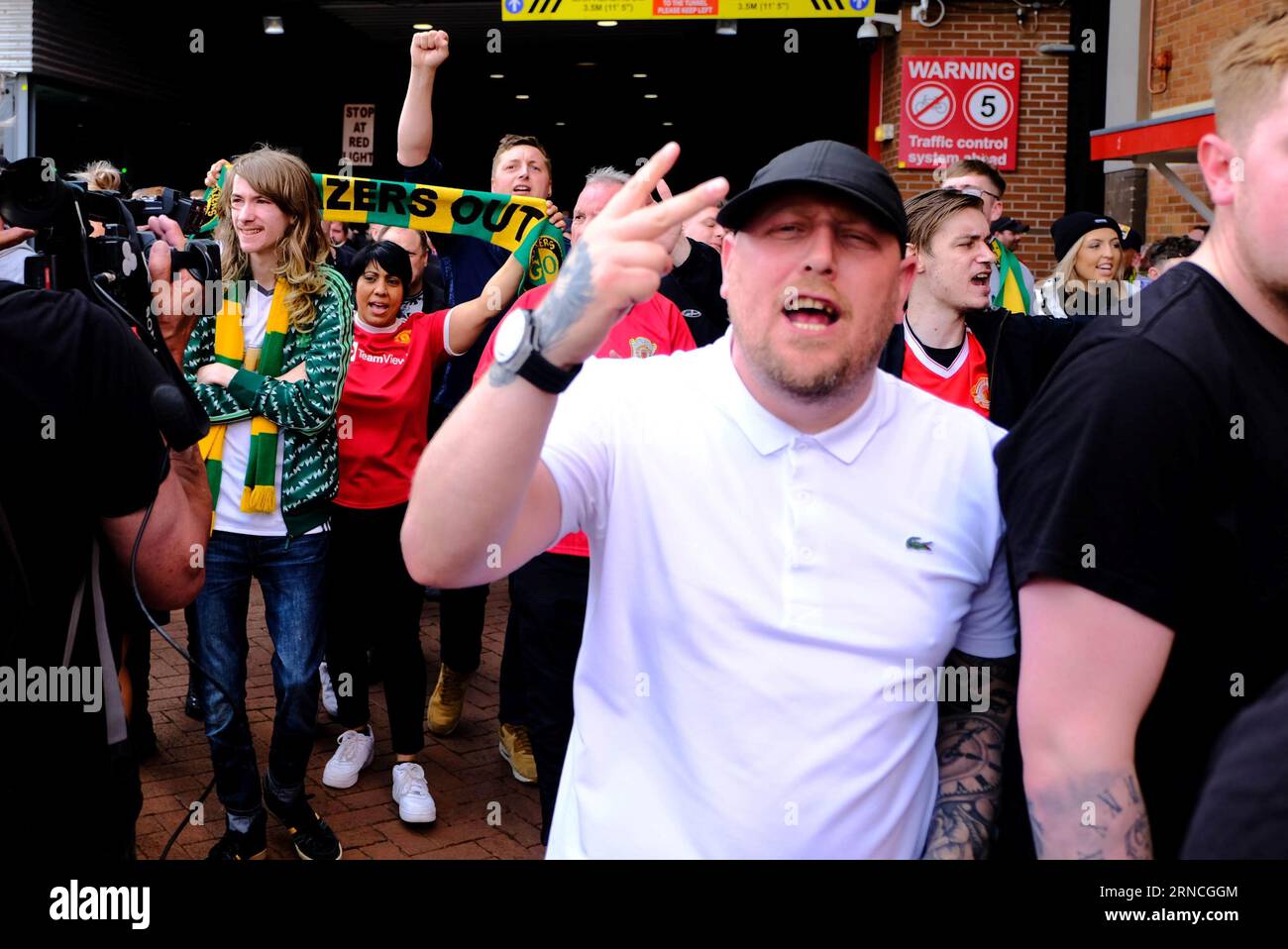 Old Trafford Football Stadium, Manchester, UK. 16th April 2022. Thousands of Manchester United protest demanding the Glazer family sell the club Stock Photo