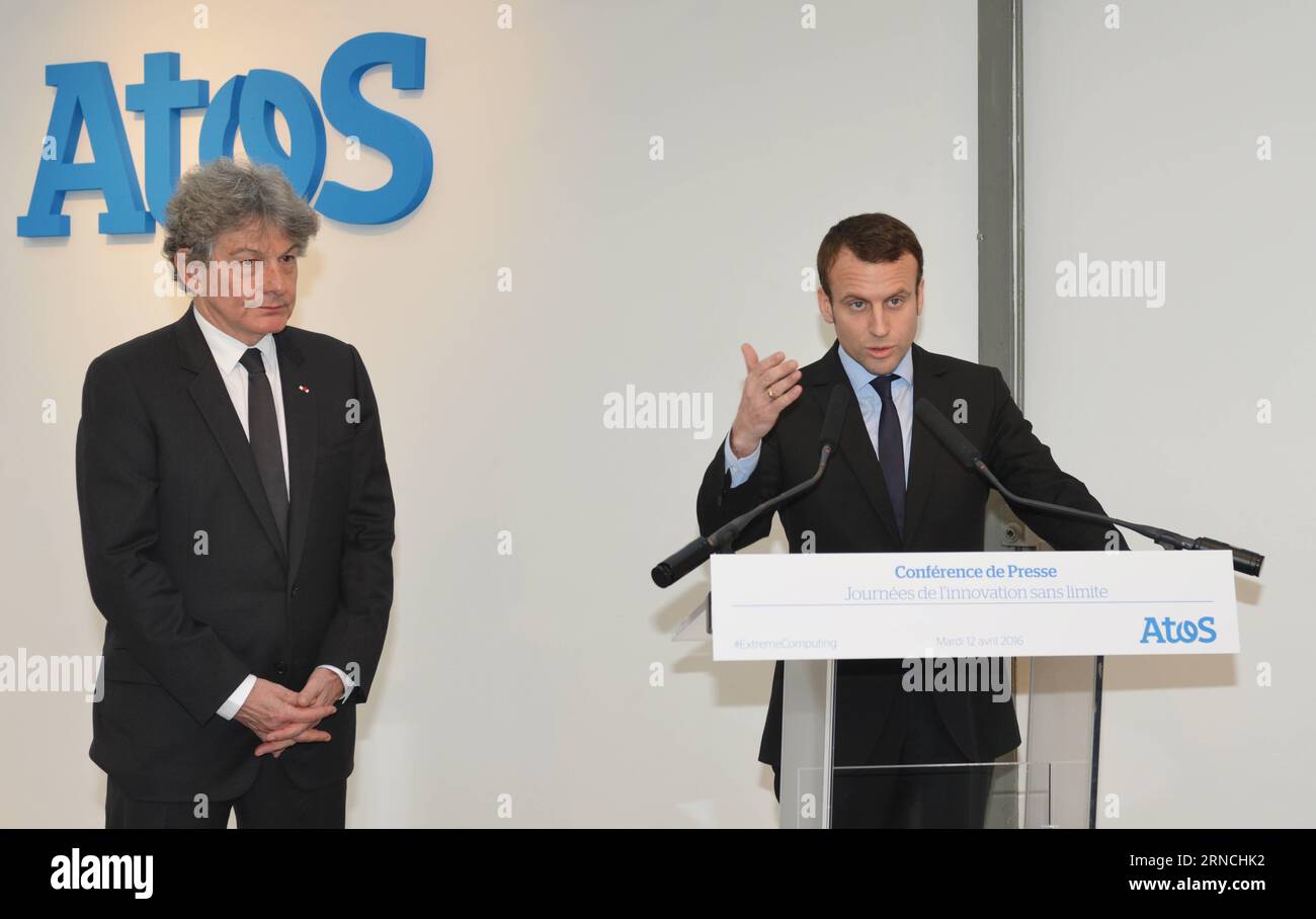 IT-Dienstleister Atos S.E. präsentiert neuen Supercomputer in Paris PARIS, April 12, 2016 -- French Economy Minister Emmanuel Macron R accompanied by Thierry Breton, Chairman and Chief Executive Officer of Atos, speaks at the press conference during the presentation of the new Bull sequana supercomputer in Paris, France, April 12, 2016.  lyi FRANCE-COMPUTER-ATOS-BRETON-MACRON LixGenxing PUBLICATIONxNOTxINxCHN Stock Photo