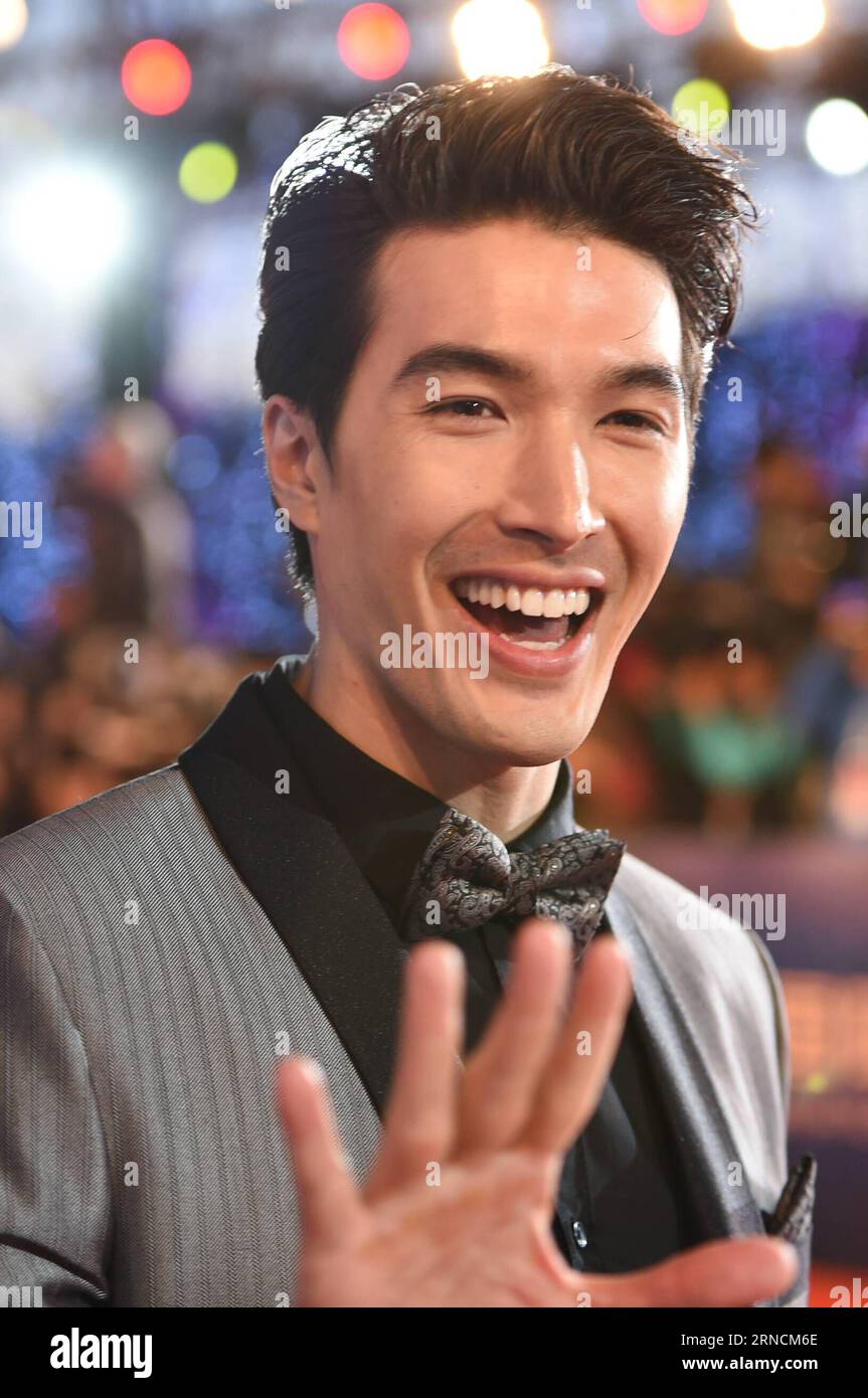 (160416) -- BEIJING, April 16, 2016 -- Actor Vivian Dawson waves to the crowds as he attends a red carpet event held for the opening ceremony of the 6th Beijing International Film Festival (BJIFF) in Beijing, capital of China, April 16, 2016. The BJIFF kicked off Saturday and will last until April 23. ) (mp) CHINA-BEIJING-FILM FESTIVAL-OPENING (CN) YaoxJianfeng PUBLICATIONxNOTxINxCHN   160416 Beijing April 16 2016 Actor Vivian Dawson Waves to The Crowds As he Attends a Red Carpet Event Hero for The Opening Ceremony of The 6th Beijing International Film Festival BJIFF in Beijing Capital of Chin Stock Photo