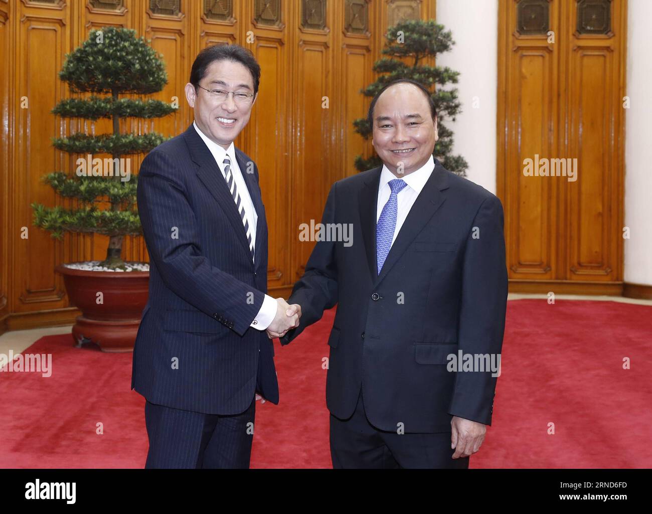 (160505) -- HANOI, May 5, 2016 -- Japanese Foreign Minister Fumio Kishida (L) meets with Vietnam s Prime Minister Nguyen Xuan Phuc in Hanoi, Vietnam, May 5, 2016. Vietnamese Prime Minister Nguyen Xuan Phuc called on the Japanese government to provide long-term support for Vietnam in adapting to climate change, especially drought and saline intrusion. ) VIETNAM-HANOI-JAPAN-FM-VISIT VNA PUBLICATIONxNOTxINxCHN   160505 Hanoi May 5 2016 Japanese Foreign Ministers Fumio Kishida l Meets With Vietnam S Prime Ministers Nguyen Xuan Phuc in Hanoi Vietnam May 5 2016 Vietnamese Prime Ministers Nguyen Xuan Stock Photo