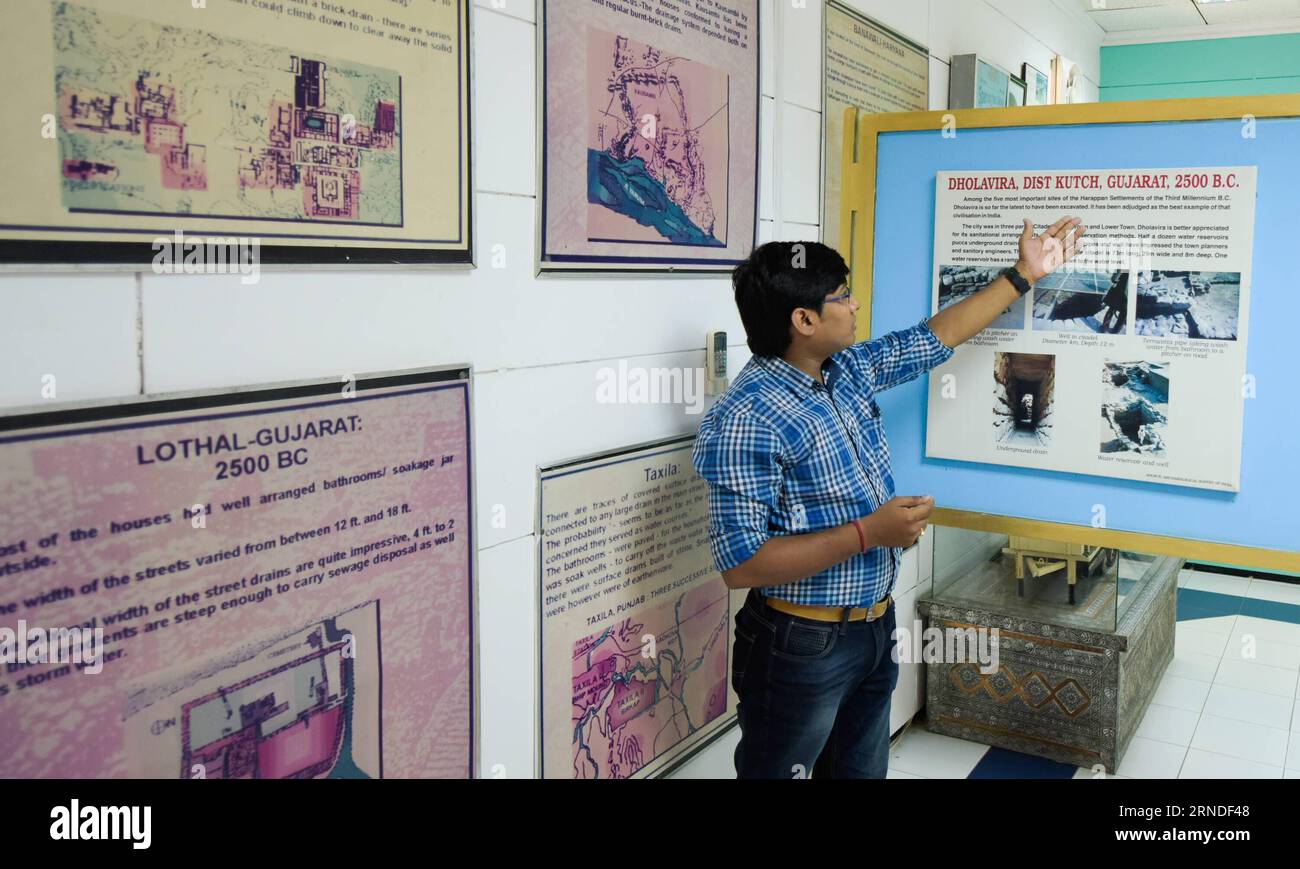 (160518) NEW DELHI, May 18, 2016 A staff member introduces