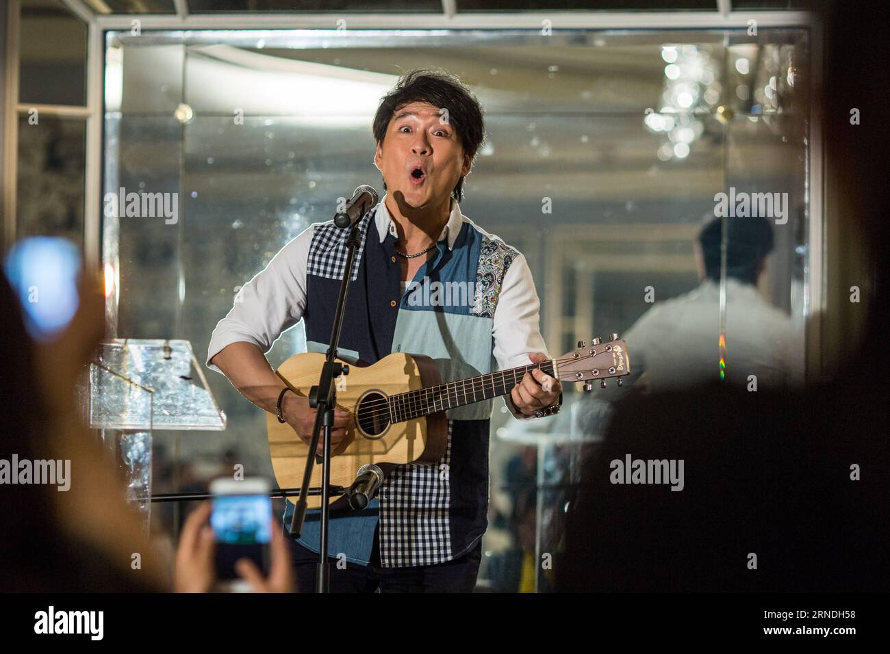 (160520) -- NEW YORK, May 20, 2016 -- Singer Emil Wakin Chau sings during a press conference for his upcoming concert What we are going to sing today in New York, the United States on May 20, 2016. Emil Wakin Chau will hold his personal concert What we are going to sing today at Lincoln Center in New York on May 22. ) U.S.-NEW YORK-WAKIN CHAU-CONCERT-PRESS CONFERENCE LixMuzi PUBLICATIONxNOTxINxCHN   160520 New York May 20 2016 Singer Emil Wakin Chau Sings during a Press Conference for His upcoming Concert What We are Going to Sing Today in New York The United States ON May 20 2016 Emil Wakin C Stock Photo