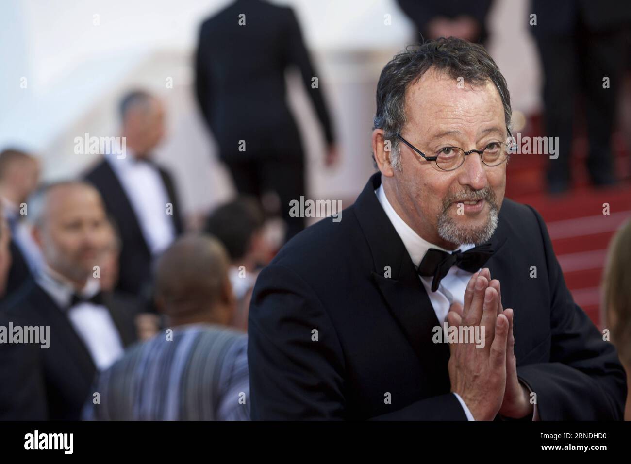 Cast member Jean Reno poses on the red carpet as he arrives for the ...