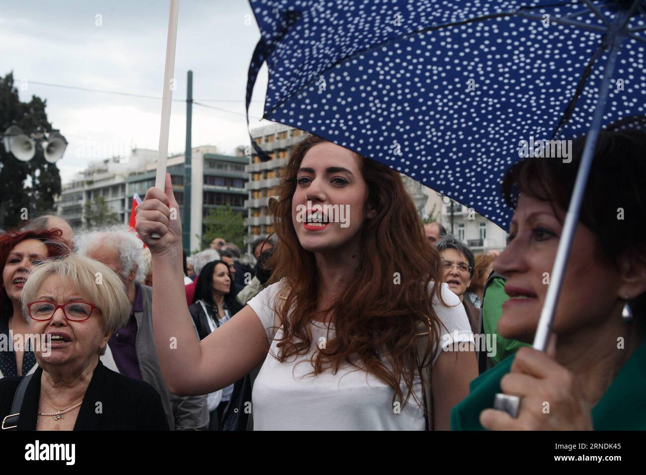 (160523) -- ATHENS, May 22, 2016 -- Demonstrators shout slogans during a protest in Athens, Greece, May 22, 2016. Approximately 11,000 demonstrators, according to police estimates, participated in the rallies staged by labor unions to protest against an omnibus bill. The critical multi-bill containing the last set of prior actions demanded by Greece s creditors to complete the first review of the Greek third program, unlock the next bailout tranche and open the way to debt relief talks was approved by the majority of Greek legislators on Sunday. ) GREECE-ATHENS-POLITICS-PROTEST MariosxLolos PU Stock Photo