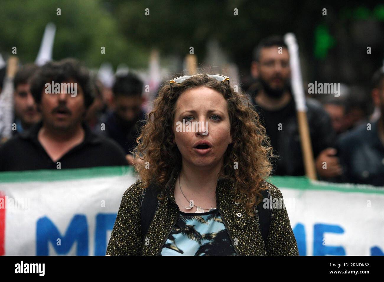 (160523) -- ATHENS, May 22, 2016 -- Demonstrators take part in a protest in Athens, Greece, May 22, 2016. Approximately 11,000 demonstrators, according to police estimates, participated in the rallies staged by labor unions to protest against an omnibus bill. The critical multi-bill containing the last set of prior actions demanded by Greece s creditors to complete the first review of the Greek third program, unlock the next bailout tranche and open the way to debt relief talks was approved by the majority of Greek legislators on Sunday. ) GREECE-ATHENS-POLITICS-PROTEST MariosxLolos PUBLICATIO Stock Photo