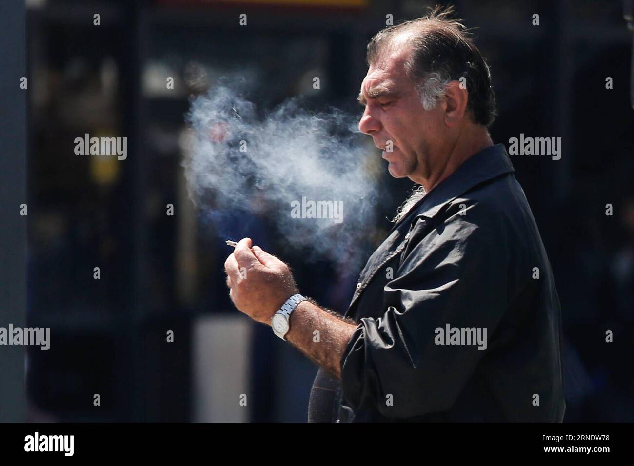 cigarettes barcelona 160531) -- BARCELONA, May 31, 2016 -- A man smokes a cigarette in Barcelona, Spain, May 31, 2016. Around 60,000 people, including 1,500-3,000 passive smokers, die in Spain a year as a Vintage Matchcover: Novotel Barcelona, Marlboro