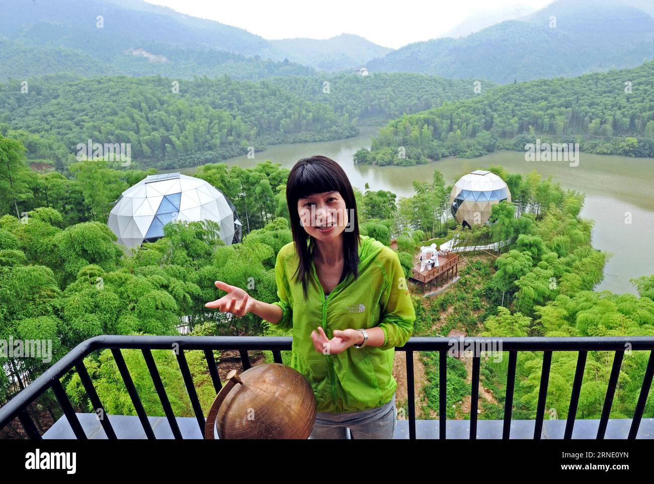 (160605) -- ANJI, June 5, 2016 -- CEO Bao Huiqin introduces her environment-friendly resort in Anji County, east China s Zhejiang Province, June 2, 2016. Anji is known for its pleasant environment with flourishing bamboo plantations and many scenes from the famous movie Crouching Tiger, Hidden Dragon were shot here. The county persists in green, low-carbon development, and strives to protect environment as well as to develop local economy. June 5 is observed as World Environment Day every year, and this year s theme issued by China s Ministry of Environment Protection is improving the quality Stock Photo