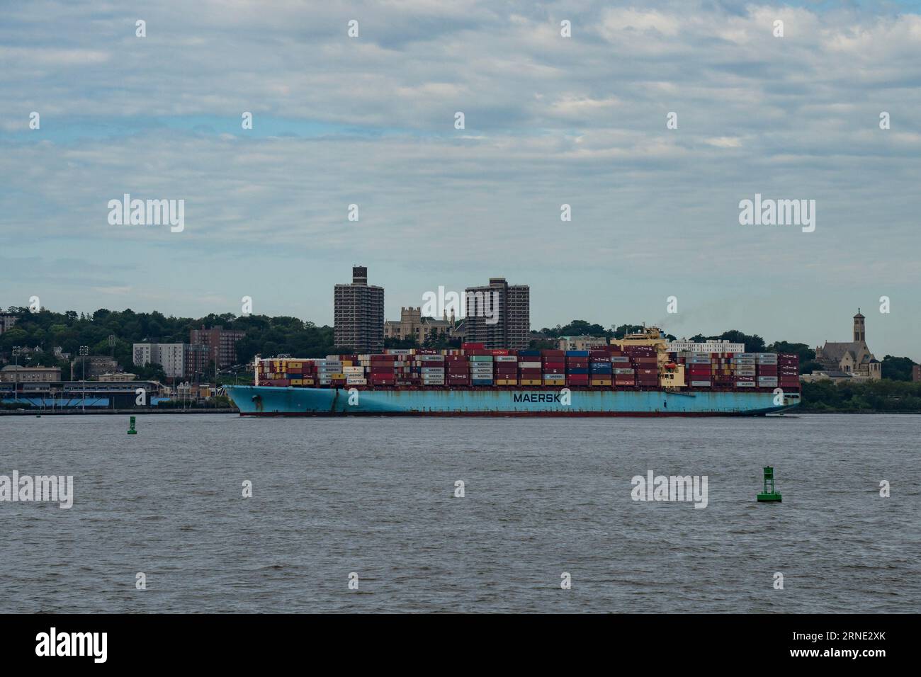 New York, USA July 21st, 2023 A cargo ship, loaded with containers, entering the new york bay