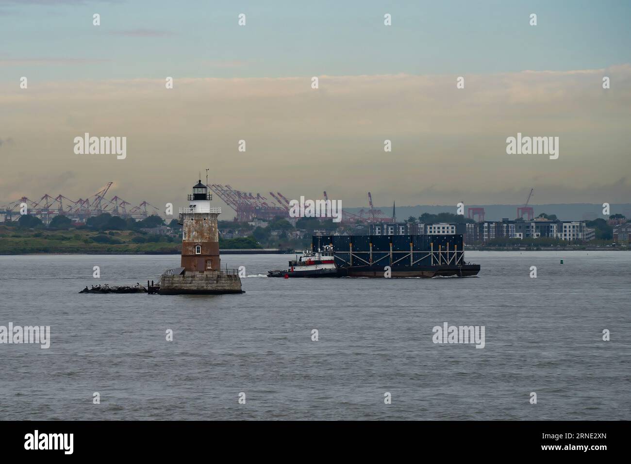 July Lighthouse New York, USA - July 21st, 2023: A small lighthouse in the new york bay ...