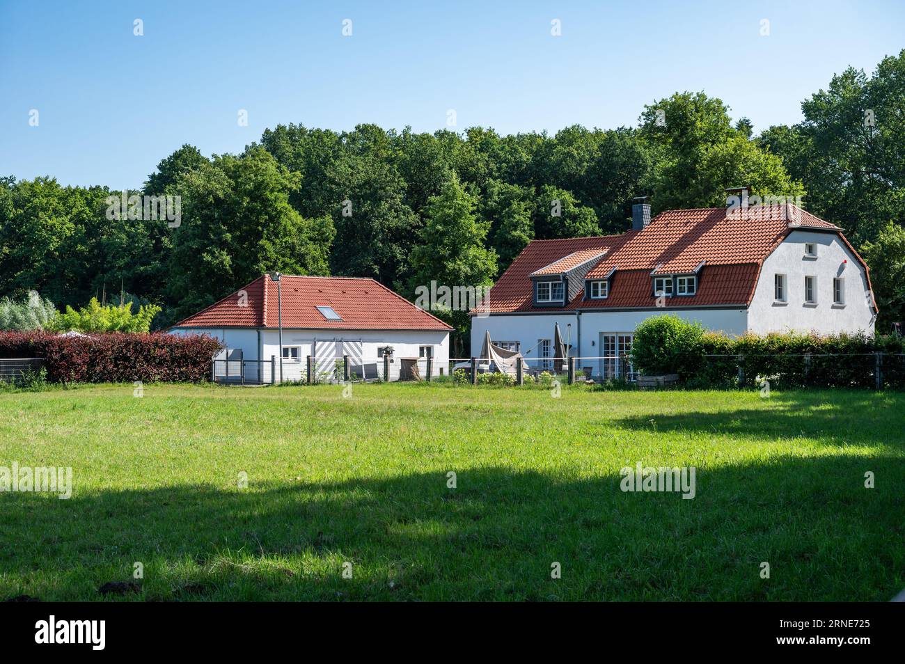 Viersen, North Rhine Westphalia, Germany, July 14, 2023 - Farmhouses in the fields at the countryside Stock Photo