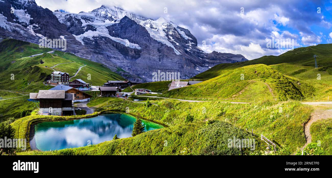 amazing Swiss nature . Kleine Scheidegg mountain pass that runs between the famous Eiger and the Lauberhorn famous for hiking in Bernese Alps. Switzer Stock Photo