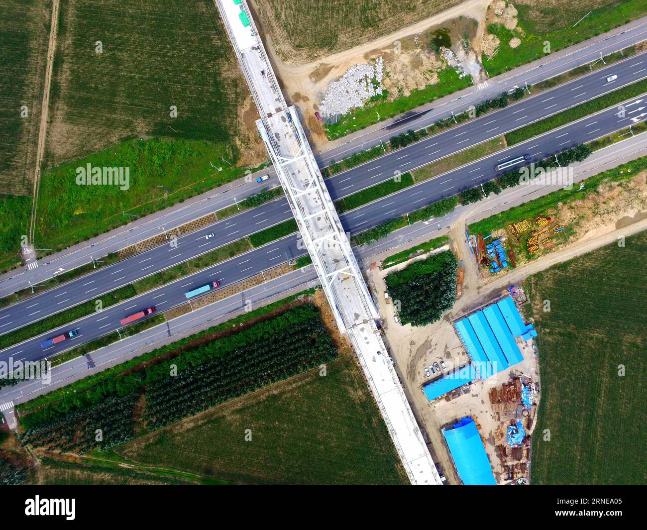 (160615) -- SHENYANG, June 15, 2016 -- Photo taken on June 15, 2016 shows the Puhe River Bridge of Liaoning section of Beijing-Shenyang high-speed railway in northeast China s Liaoning Province. The 700-kilometer-long railway line, with a designed speed of 350 km per hour, is expected to be put into operation in 2019. The construction work of the line s Liaoning section has entered track-related phase. )(mcg) CHINA-BEIJING-SHENYANG-HIGH-SPEED RAILWAY-CONSTRUCTION (CN) XingxGuangli PUBLICATIONxNOTxINxCHN   160615 Shenyang June 15 2016 Photo Taken ON June 15 2016 Shows The  River Bridge of Liaon Stock Photo