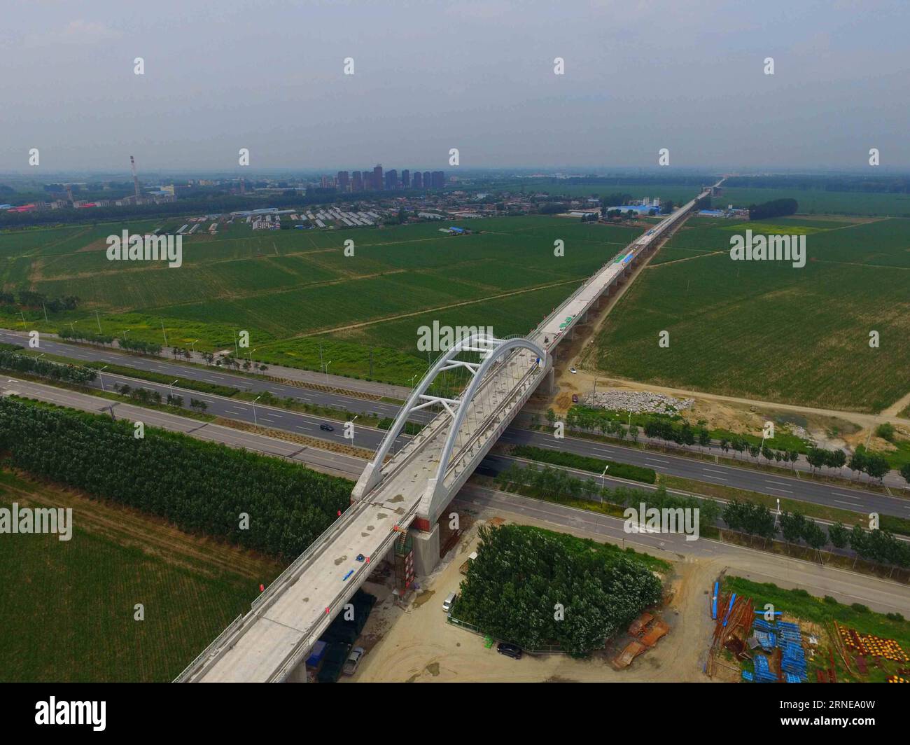 (160615) -- SHENYANG, June 15, 2016 -- Photo taken on June 15, 2016 shows the Puhe River Bridge of Liaoning section of Beijing-Shenyang high-speed railway in northeast China s Liaoning Province. The 700-kilometer-long railway line, with a designed speed of 350 km per hour, is expected to be put into operation in 2019. The construction work of the line s Liaoning section has entered track-related phase. )(mcg) CHINA-BEIJING-SHENYANG-HIGH-SPEED RAILWAY-CONSTRUCTION (CN) XingxGuangli PUBLICATIONxNOTxINxCHN   160615 Shenyang June 15 2016 Photo Taken ON June 15 2016 Shows The  River Bridge of Liaon Stock Photo
