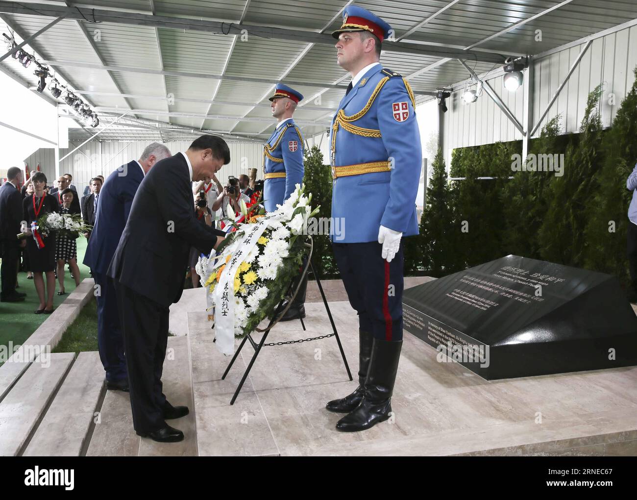 Chinese President Xi Jinping and his wife Peng Liyuan pay homage to the Chinese martyrs killed in the NATO bombing of the former Chinese embassy in the Federal Republic of Yugoslavia in May 1999, after arriving in Belgrade for a state visit to Serbia, June 17, 2016. The three martyrs were journalists Shao Yunhuan of Xinhua News Agency, and Xu Xinghu and his wife Zhu Ying, of the Guangming Daily newspaper. Lan Hongguang)(wjq) SERBIA-BELGRADE-CHINA-XI JINPING-VISIT LanxHonguang PUBLICATIONxNOTxINxCHN   Chinese President Xi Jinping and His wife Peng Liyuan Pay Homage to The Chinese Martyrs KILLED Stock Photo