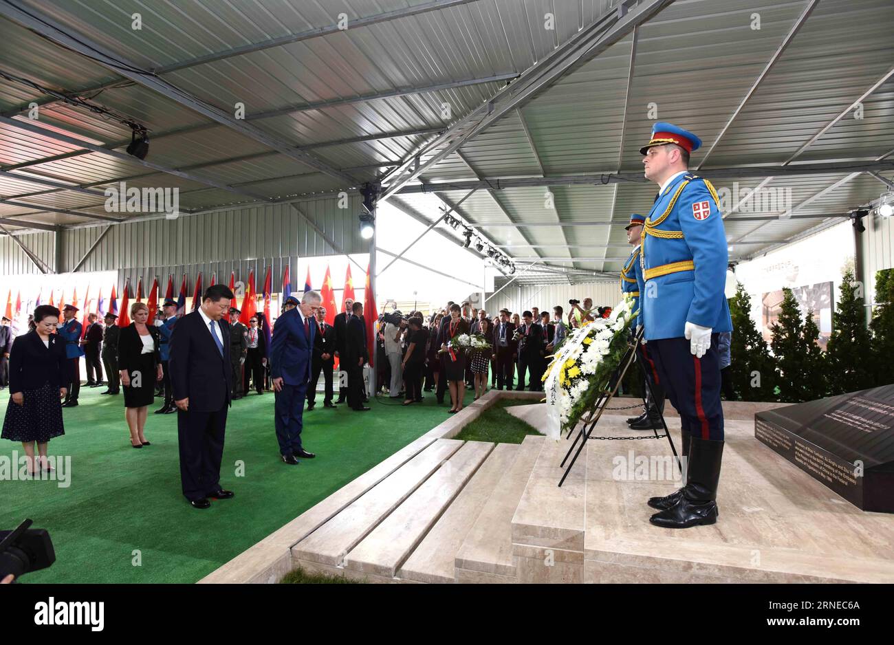 (160617) -- BELGRADE, June 17, 2016 -- Chinese President Xi Jinping and his wife Peng Liyuan pay homage to the Chinese martyrs killed in the NATO bombing of the former Chinese embassy in the Federal Republic of Yugoslavia in May 1999, after arriving in Belgrade for a state visit to Serbia, June 17, 2016. The three martyrs were journalists Shao Yunhuan of Xinhua News Agency, and Xu Xinghu and his wife Zhu Ying, of the Guangming Daily newspaper. )(wjq) SERBIA-BELGRADE-CHINA-XI JINPING-VISIT RaoxAimin PUBLICATIONxNOTxINxCHN   160617 Belgrade June 17 2016 Chinese President Xi Jinping and His wife Stock Photo