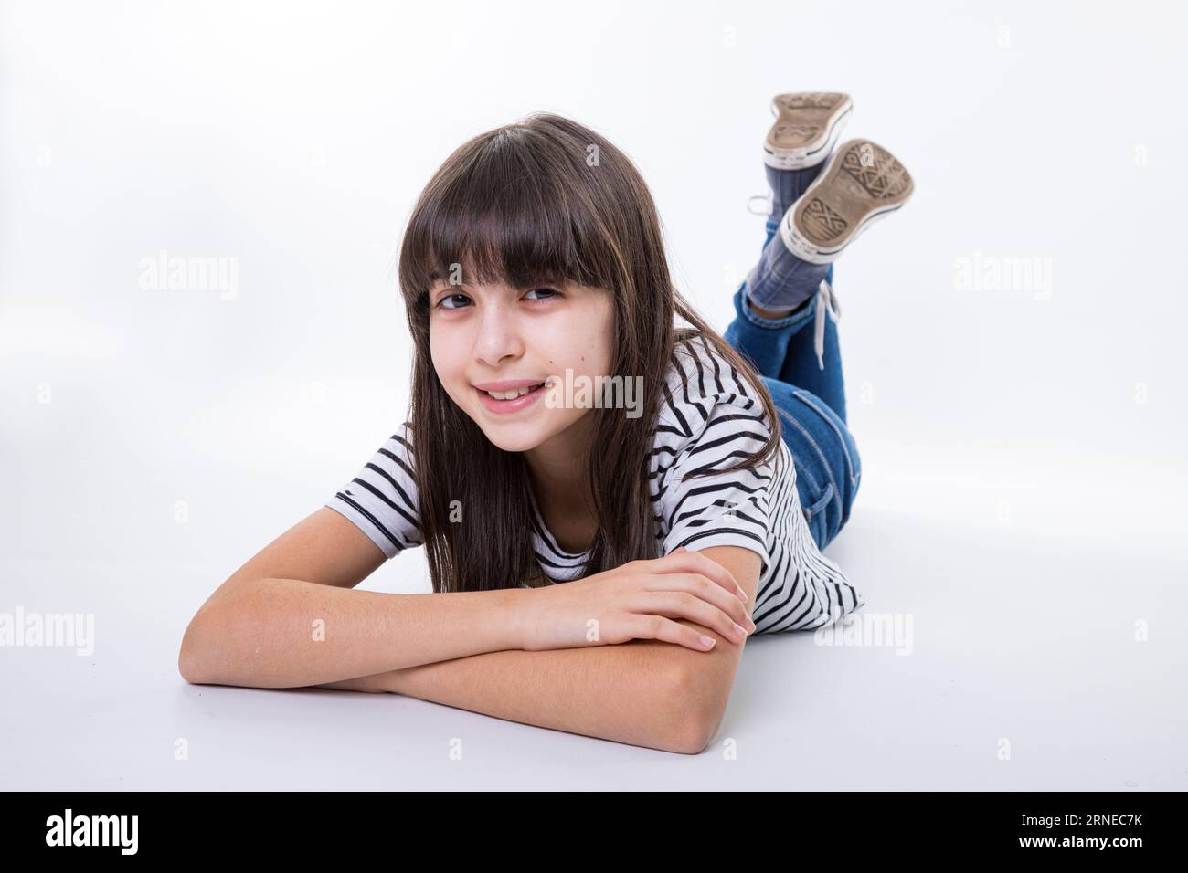 Teen girl legs crossed floor hi-res stock photography and images - Alamy