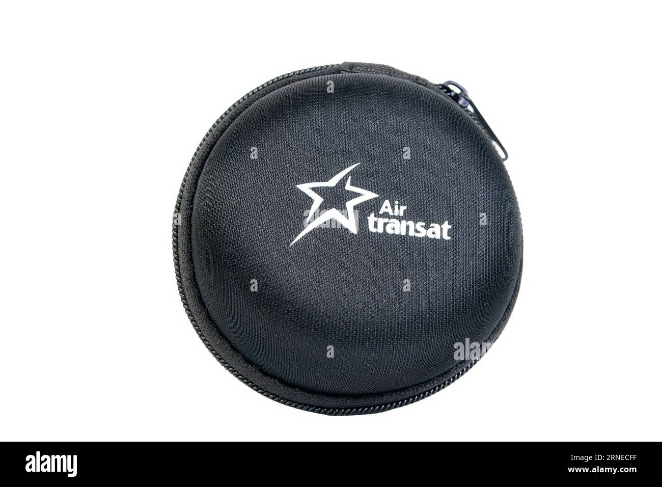 Logo of Air Transat in a headphones case. Stock Photo