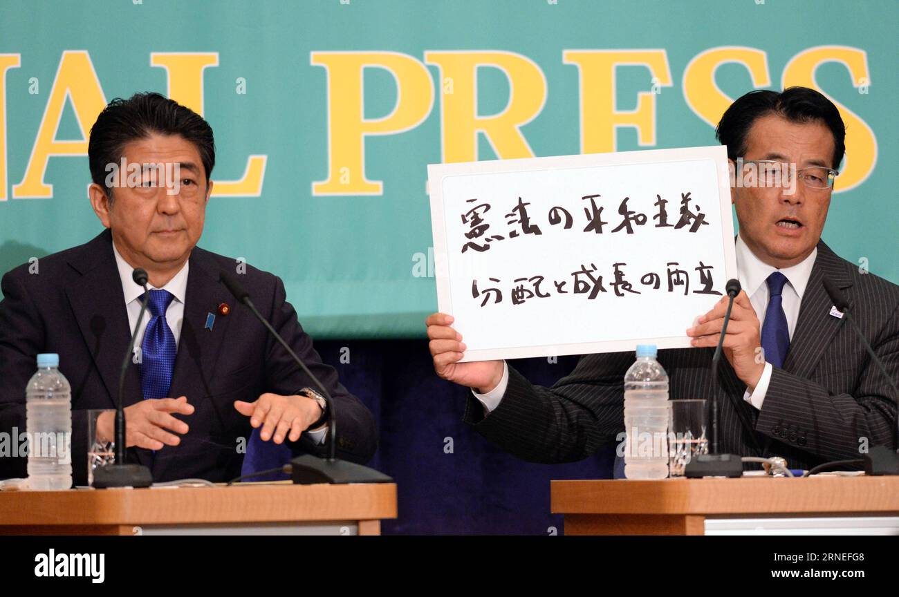 (160621) -- TOKYO, June 21, 2016 -- President of the ruling Liberal Democratic Party Shinzo Abe (L) and Katsuya Okada, leader of the main opposition Democratic Party of Japan, attend a debate in Tokyo, capital of Japan, June 21, 2016. Leaders of Japanese political parties on Tuesday debated on key political and economic issues ahead of the upcoming House of Councillors election slated for July 10, with the ruling camp seeking to gain over two thirds of the seats in the chamber so as to launch a Constitution amendment motion. ) (cl) JAPAN-TOKYO-POLITICAL PARTIES-DEBATE MaxPing PUBLICATIONxNOTxI Stock Photo